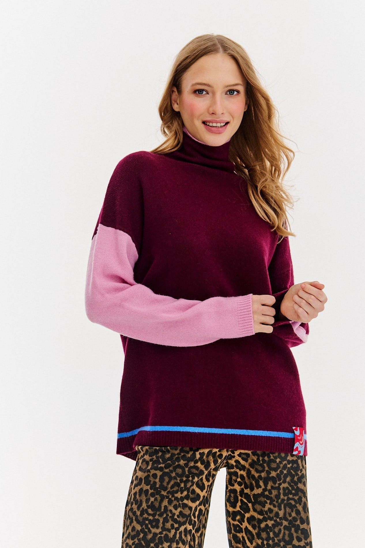 Wełniany sweter z golfem Rose Whisper