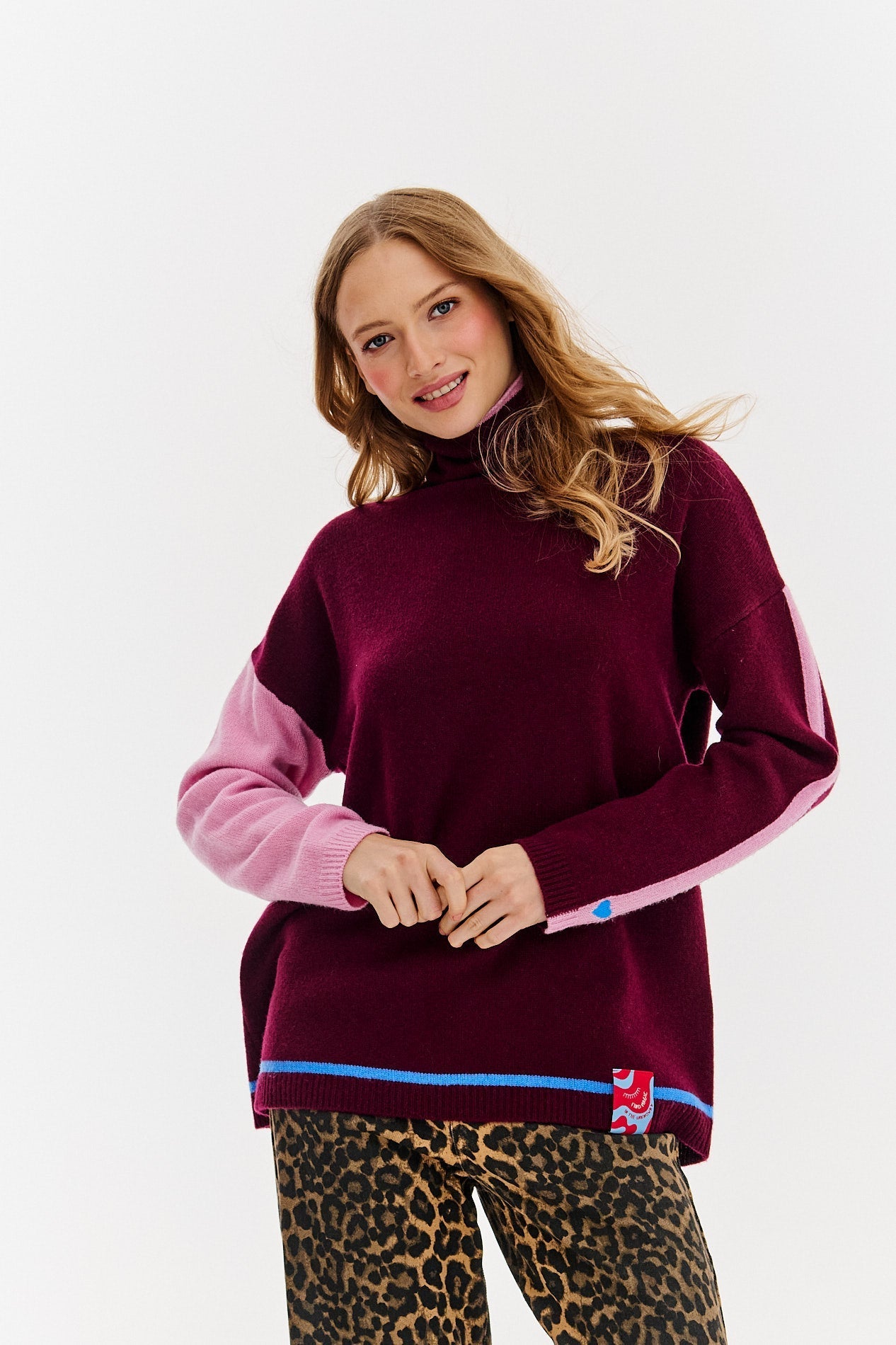 Wełniany sweter z golfem Rose Whisper